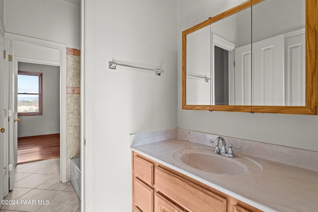 11645 E Prescott Dells Rnch Rd, Dewey-Humboldt, AZ 86327 - bathroom with tile patterned flooring, vanity, and a tub