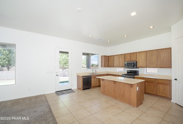 6560 E Brombil St, Prescott Valley, AZ 86314 - kitchen featuring stainless steel microwave, gas range, a sink, dishwashing machine, and light countertops