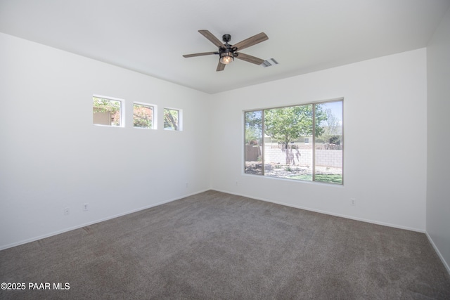6560 E Brombil St, Prescott Valley, AZ 86314 - carpeted empty room with healthy amount of natural light, a ceiling fan, and baseboards