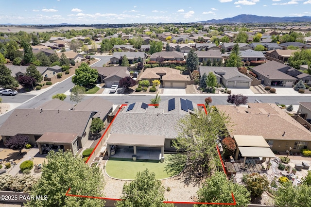 6560 E Brombil St, Prescott Valley, AZ 86314 - aerial view of residential area with property parcel outlined and a mountainous background