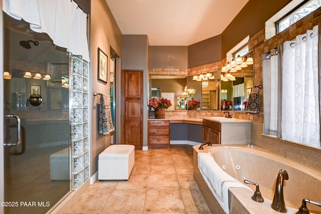 1021 Sheriffs Posse Trl, Prescott, AZ 86303 - full bath with a stall shower, a jetted tub, vanity, and tile patterned flooring