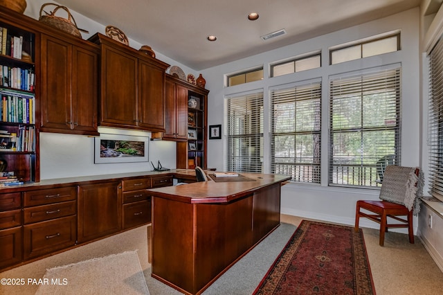 1021 Sheriffs Posse Trl, Prescott, AZ 86303 - office space featuring light carpet, recessed lighting, and built in desk