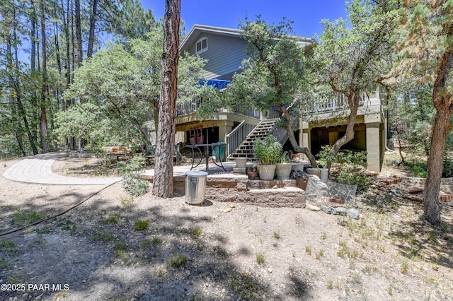 1021 Sheriffs Posse Trl, Prescott, AZ 86303 - back of house with stairway and a deck