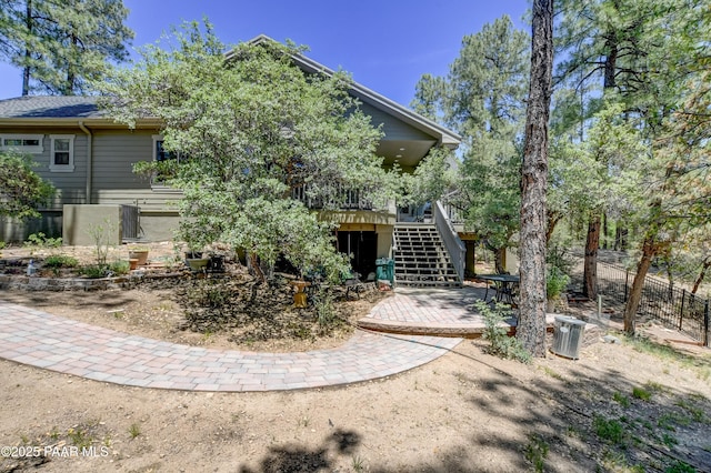 1021 Sheriffs Posse Trl, Prescott, AZ 86303 - rear view of house with stairs and a patio area