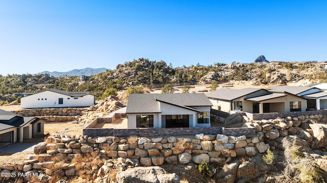 exterior space with a mountain view