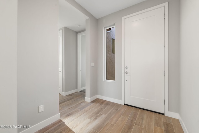 foyer with light wood-type flooring