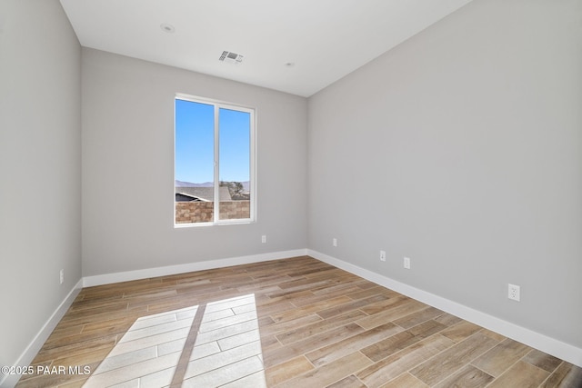 empty room featuring light hardwood / wood-style flooring