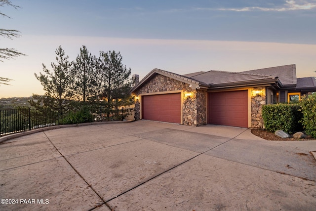 view of front of home with a garage