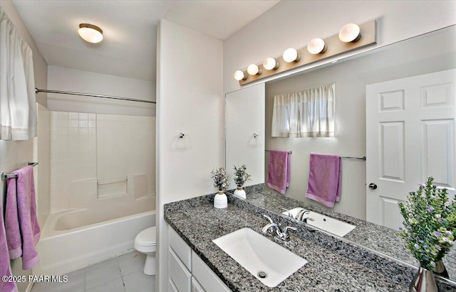 full bathroom featuring vanity, toilet, tile patterned floors, and shower / washtub combination