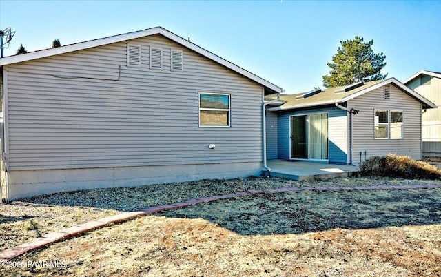 rear view of property with a patio