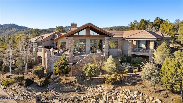 view of front of property with a balcony