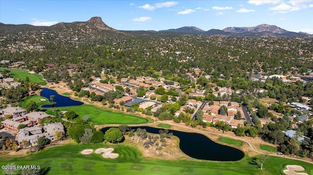 bird's eye view featuring a water and mountain view