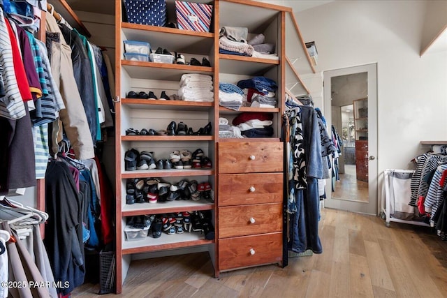 walk in closet featuring light wood-type flooring