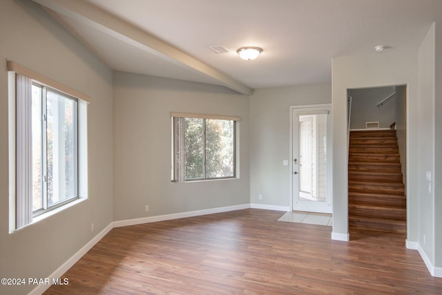 entryway with hardwood / wood-style flooring