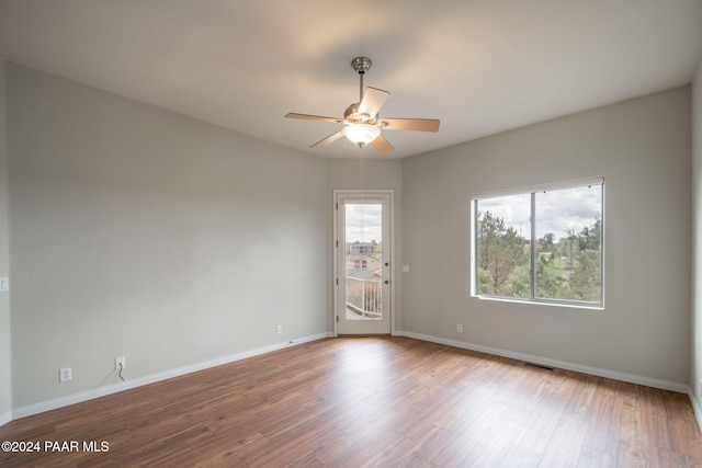 unfurnished room featuring ceiling fan and wood-type flooring