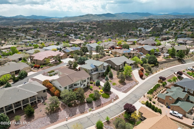 drone / aerial view featuring a mountain view