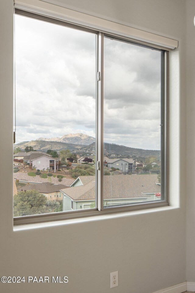 balcony featuring a mountain view