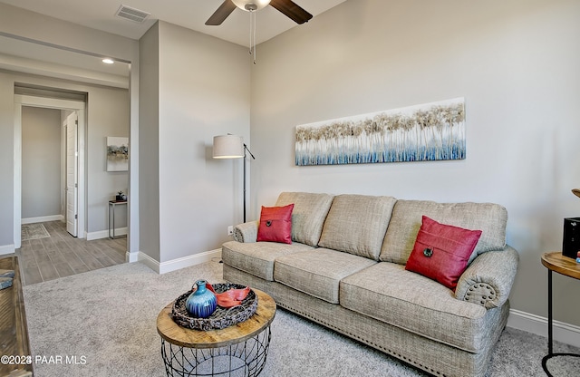 living room featuring ceiling fan