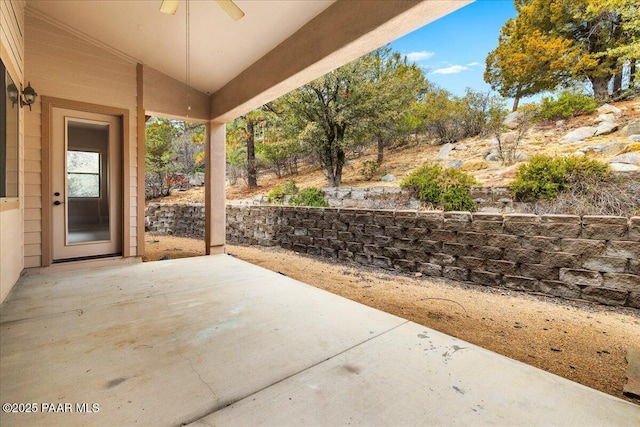 view of patio / terrace featuring ceiling fan