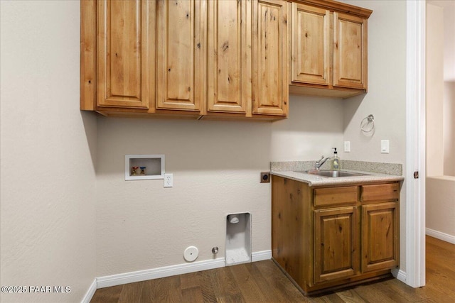 laundry room featuring washer hookup, a sink, gas dryer hookup, cabinet space, and hookup for an electric dryer