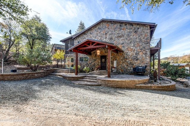 rear view of property with a patio