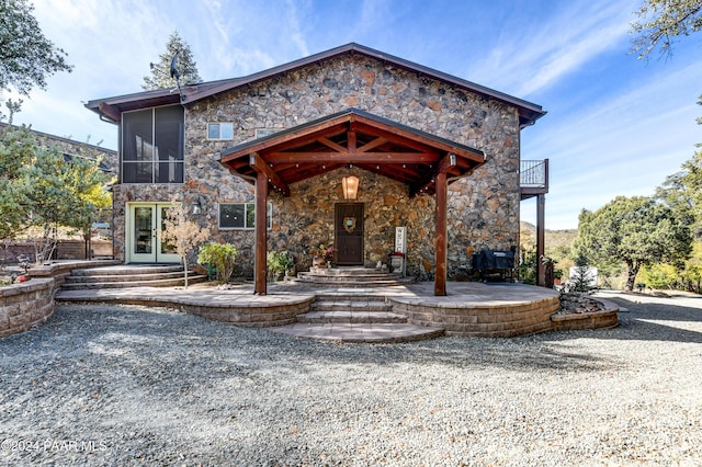 view of front of property featuring a patio