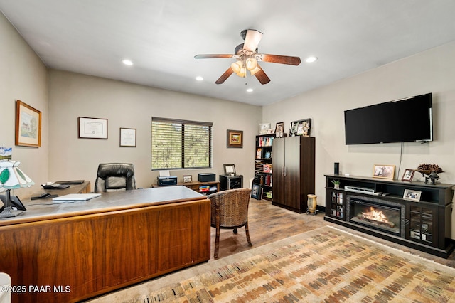 6231 S Champion Way Rd, Prescott, AZ 86303 - office with ceiling fan, wood finished floors, recessed lighting, and a glass covered fireplace