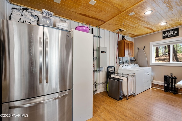 6231 S Champion Way Rd, Prescott, AZ 86303 - laundry area featuring separate washer and dryer, wood ceiling, and light wood-style floors