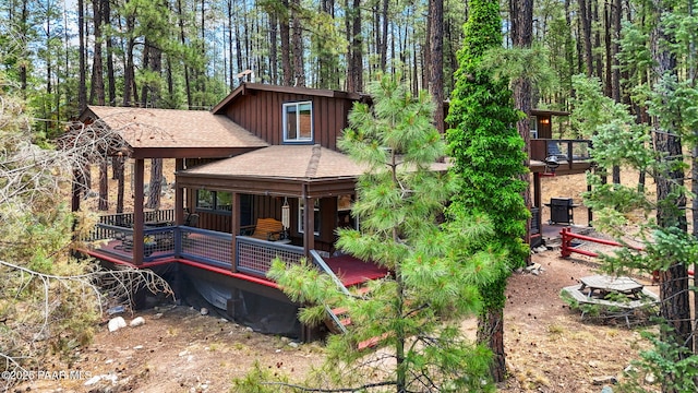 6231 S Champion Way Rd, Prescott, AZ 86303 - view of front of property with roof with shingles, board and batten siding, and a wooden deck