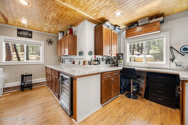 6231 S Champion Way Rd, Prescott, AZ 86303 - kitchen featuring beverage cooler, brown cabinets, light wood finished floors, wooden ceiling, and recessed lighting