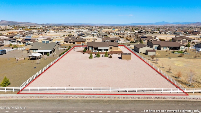 birds eye view of property with a residential view and a mountain view