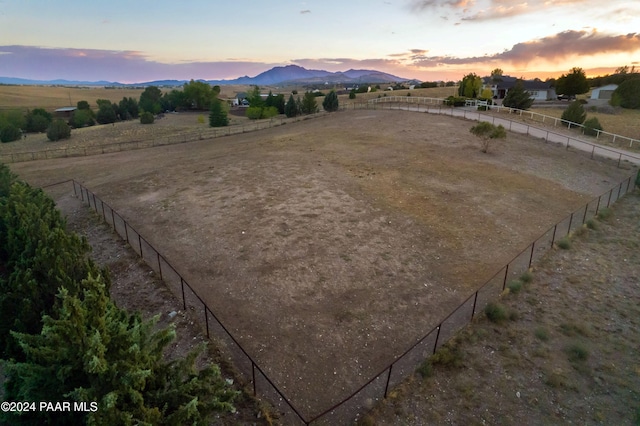 exterior space with a mountain view and a rural view