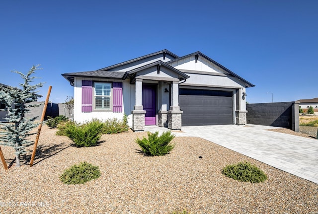 view of front of property featuring a garage