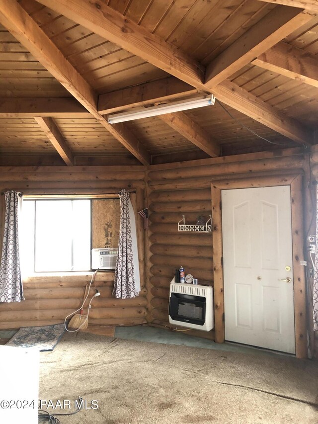 unfurnished living room featuring beamed ceiling, heating unit, rustic walls, and wood ceiling