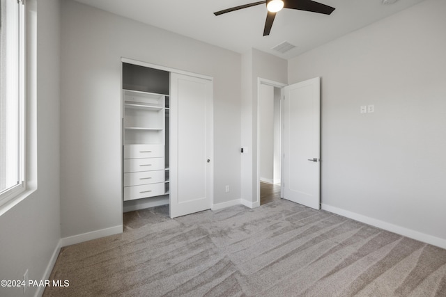 bathroom with hardwood / wood-style flooring, vanity, and toilet