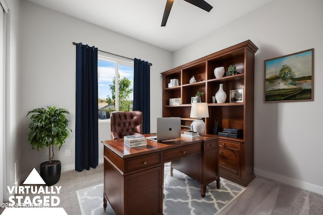 unfurnished room with carpet floors and ceiling fan