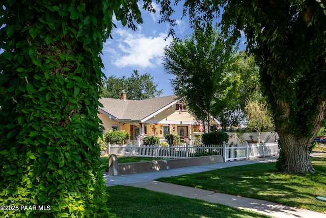 230 N Mount Vernon Ave, Prescott, AZ 86301 - view of front of property with a chimney and a fenced front yard
