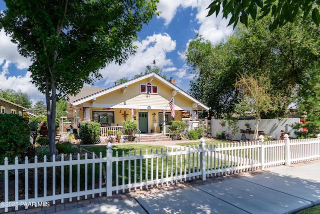 230 N Mount Vernon Ave, Prescott, AZ 86301 - view of front of home with covered porch, a chimney, and a fenced front yard