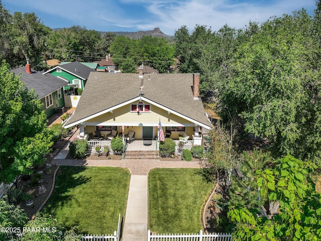 230 N Mount Vernon Ave, Prescott, AZ 86301 - craftsman-style house featuring a porch, a chimney, and a shingled roof