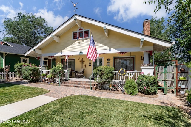 230 N Mount Vernon Ave, Prescott, AZ 86301 - view of front of home with a porch, a gate, and a chimney