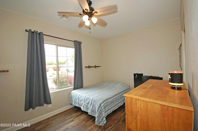 8737 N Mare St, Prescott Valley, AZ 86315 - bedroom with dark wood finished floors, baseboards, and ceiling fan