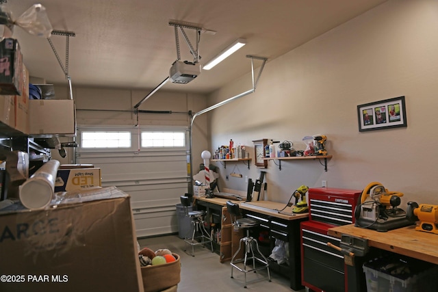 8737 N Mare St, Prescott Valley, AZ 86315 - garage featuring a workshop area and a garage door opener