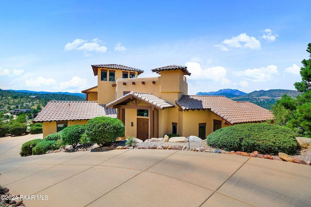 2253 Shadow Ridge Rd, Prescott, AZ 86305 - view of front facade featuring a mountain view, stucco siding, and a tiled roof