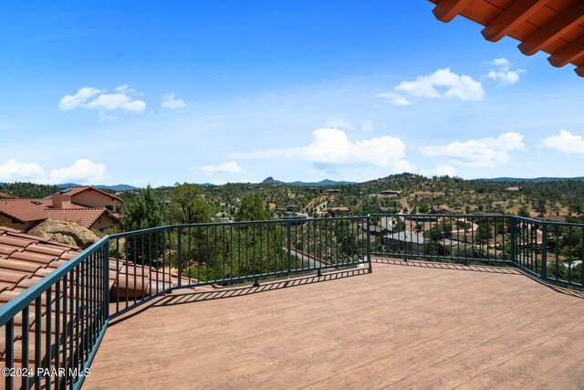 balcony featuring a mountain view