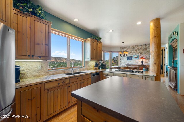 2253 Shadow Ridge Rd, Prescott, AZ 86305 - kitchen featuring appliances with stainless steel finishes, backsplash, recessed lighting, and brown cabinets