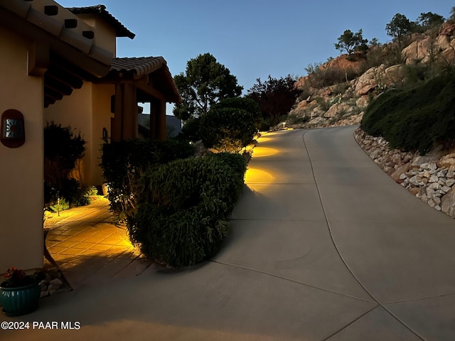 2253 Shadow Ridge Rd, Prescott, AZ 86305 - view of home's exterior with stucco siding, a tile roof, and a patio area