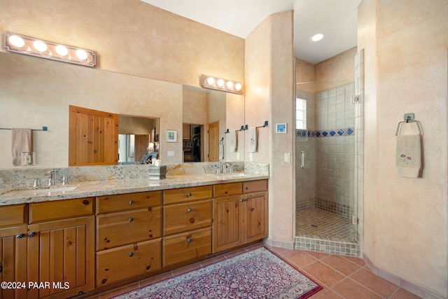 2253 Shadow Ridge Rd, Prescott, AZ 86305 - full bathroom with double vanity, a shower stall, and tile patterned floors