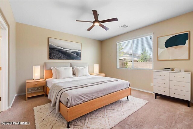 1364 Towhee Trl, Prescott, AZ 86305 - bedroom featuring light colored carpet, baseboards, and ceiling fan
