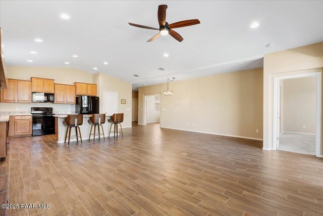 1364 Towhee Trl, Prescott, AZ 86305 - living area featuring ceiling fan, lofted ceiling, baseboards, light wood finished floors, and recessed lighting
