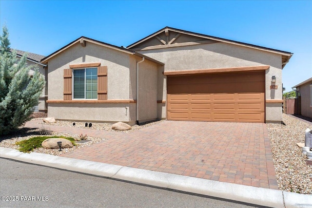 1364 Towhee Trl, Prescott, AZ 86305 - ranch-style home with stucco siding, decorative driveway, and a garage
